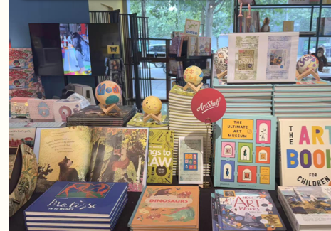 Project photo showing a curated art-book display in a museum retail setting